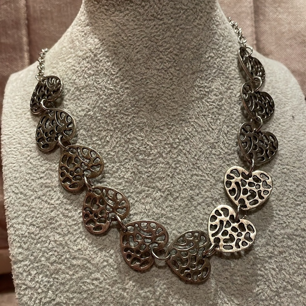 Lots of hearts necklace 18-20” safari style patterned hearts Stainless steel